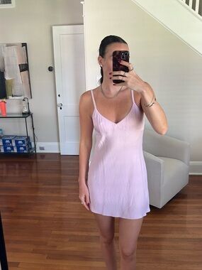 Aritzia, Sunday’s best pink slip dress